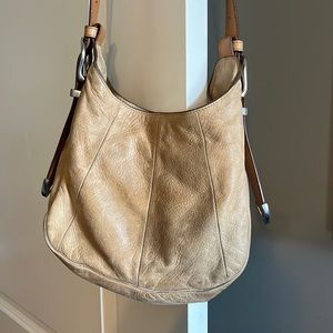 Genuine leather Frye crossbody bag. Tan color with silver hardware. Minor marks.